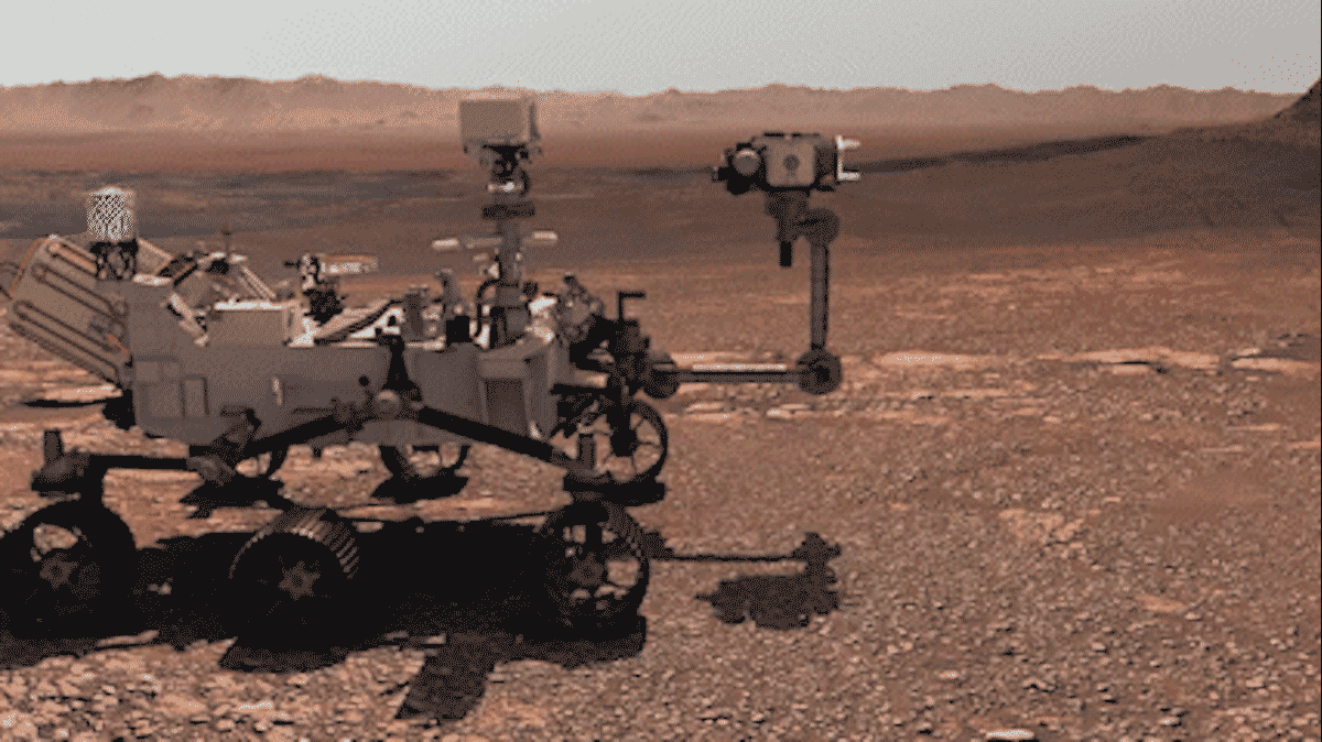 GIF showing an alien sneaking behind a rover on Mars