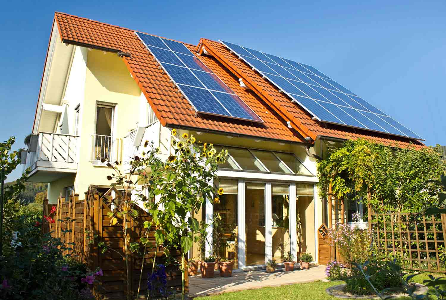 A single-family home with solar panels on the roof