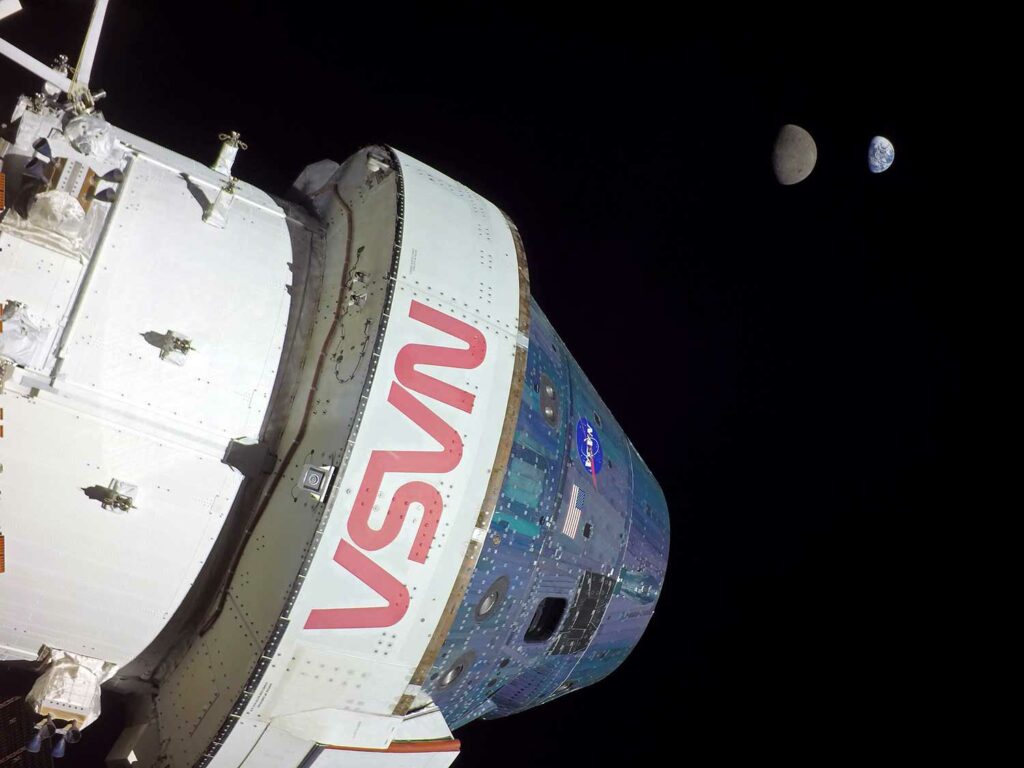 A spacecraft with the NASA logo in the foreground and the Moon and Earth in the distant background