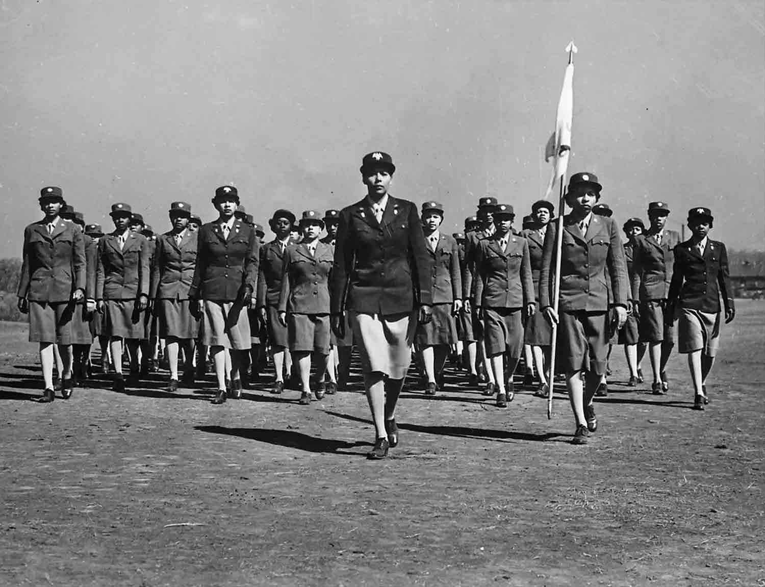 Captain Charity Earley Adams (front and center), who would later become Major Adams, drills her company at a training center in Fort Des Moines, Iowa, in 1943.