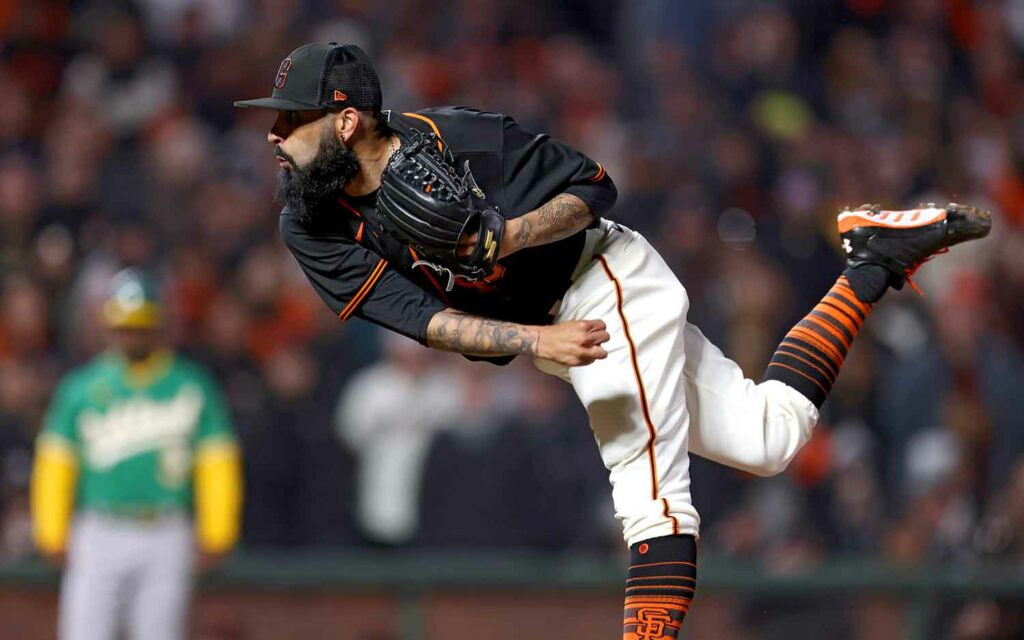 Sergio Romo in uniform on the ballfield just after pitching.