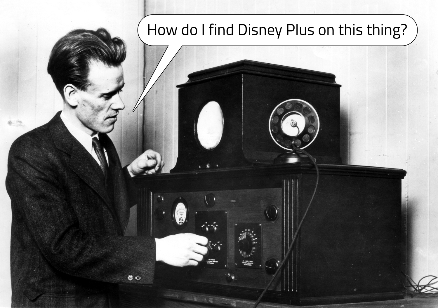A man touches a dial on a device with various dials and gauges and says how do I find Disney Plus on this thing.