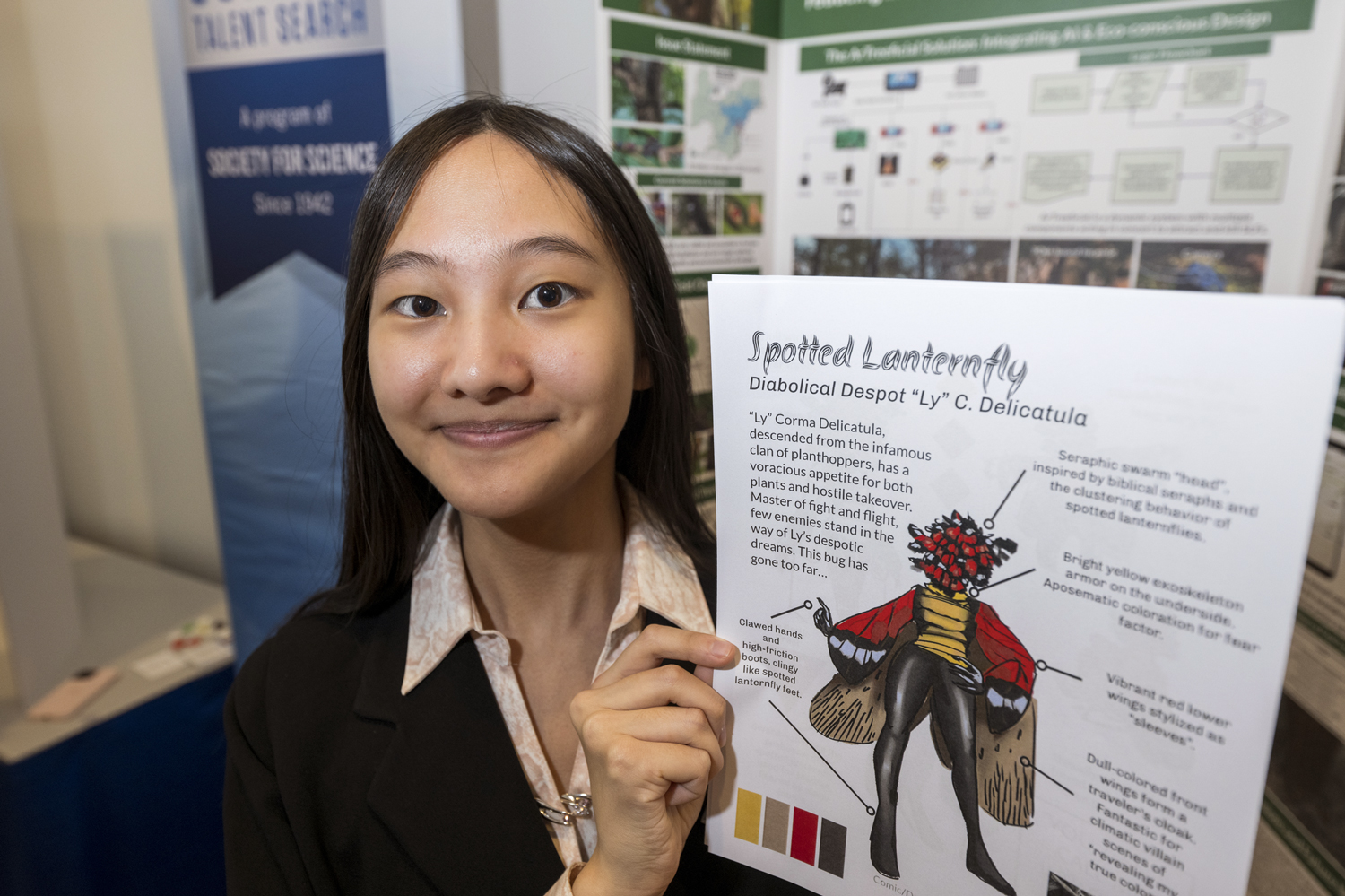 A teen stands in front of an invention presentation while holding up a poster with information about lanternflies.