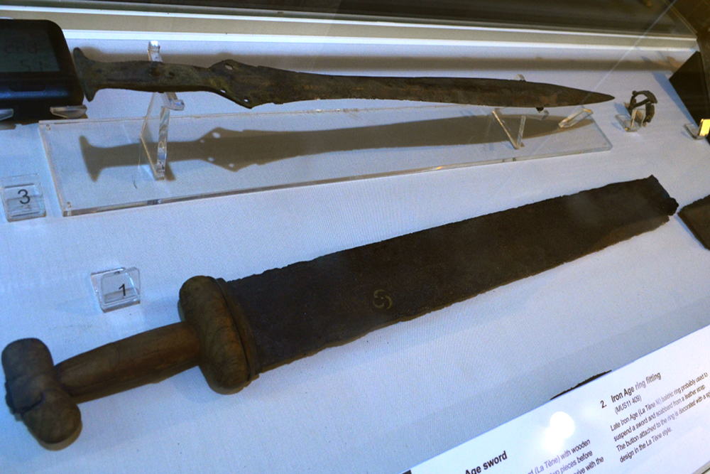 Two Iron Age swords are in a display case.