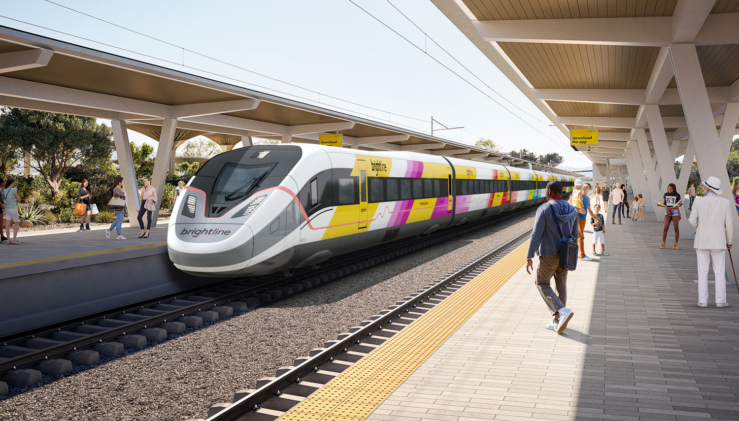 A train is painted with the word Brightline and sits at a platform where many people have gathered.