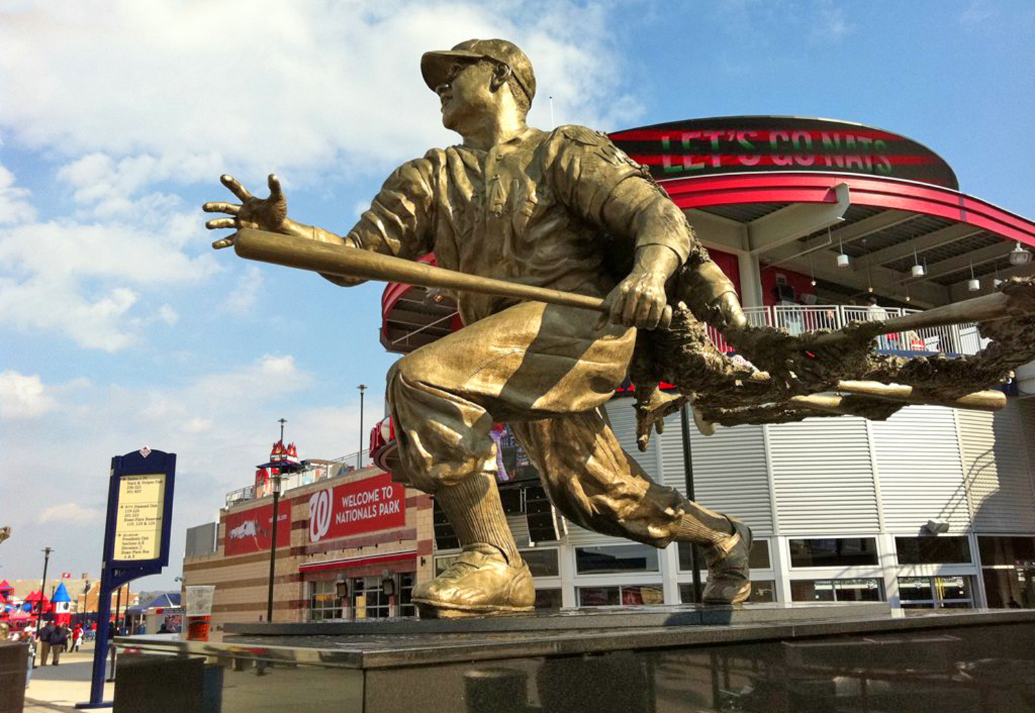 A metal statue of Josh Gibson holding a bat is outside of Nationals Park.
