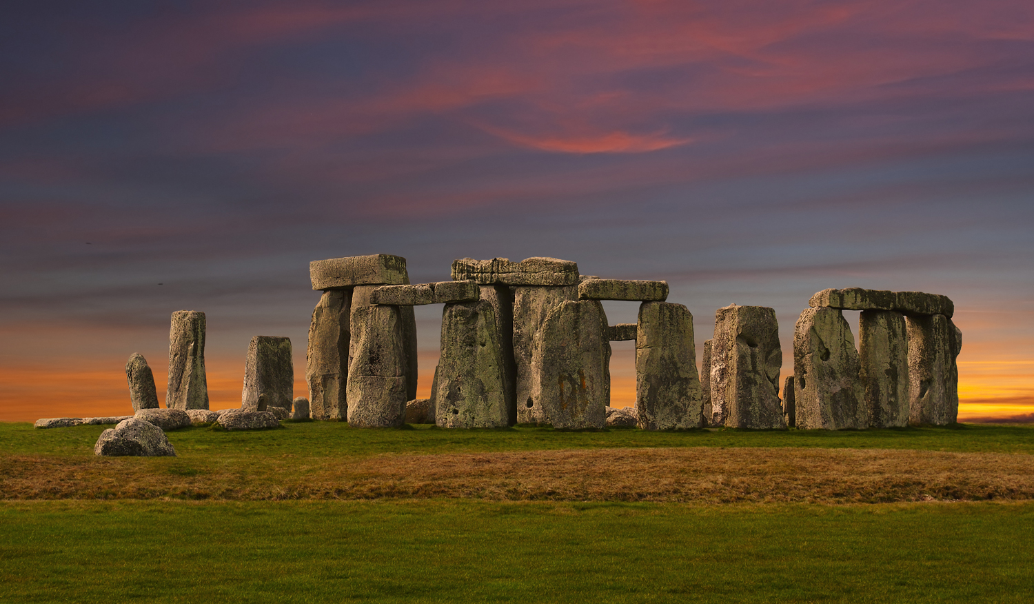 Stonehenge with a sunset in the background.