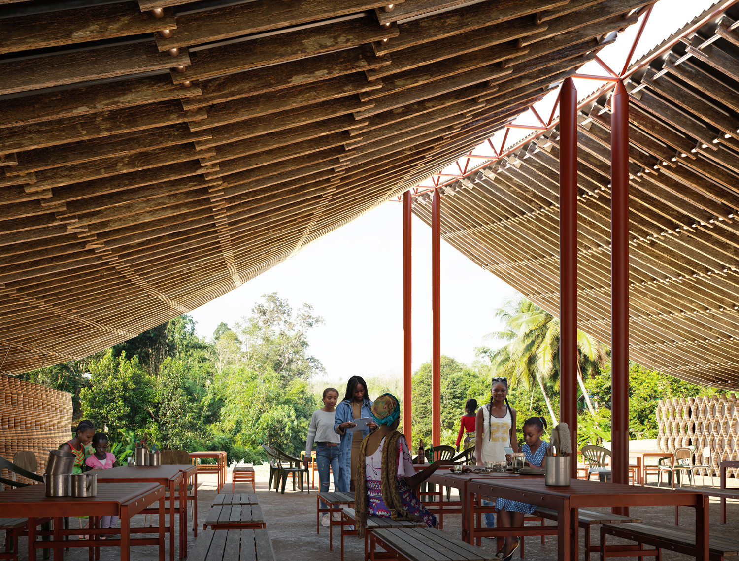 A rendering of the inside of the Home Village community center shows a sloped roof.