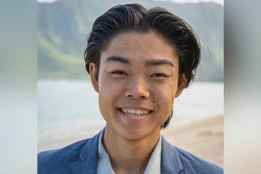 Closeup of a smiling teen.