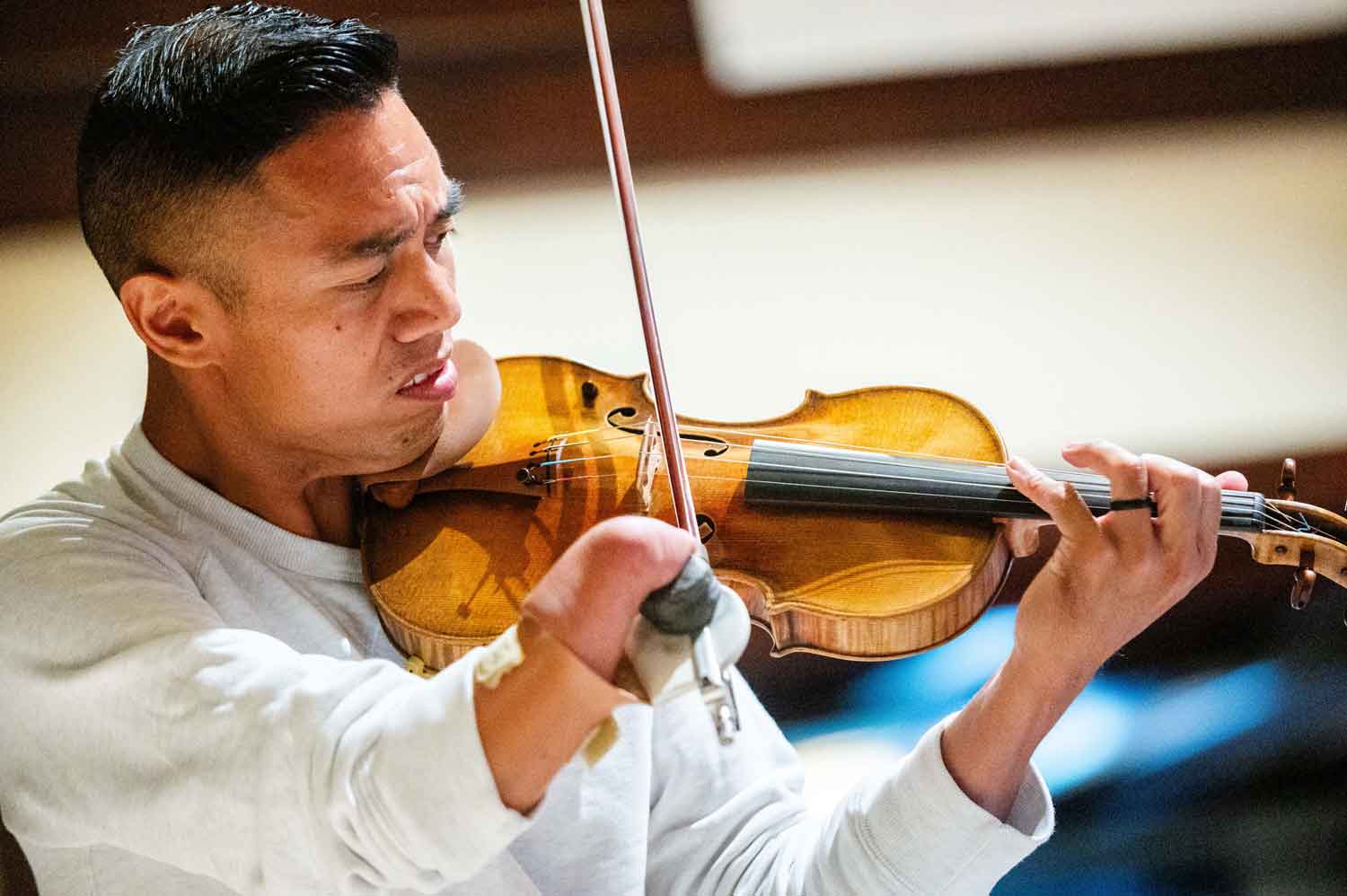 Adrian Anantawan plays the violin.