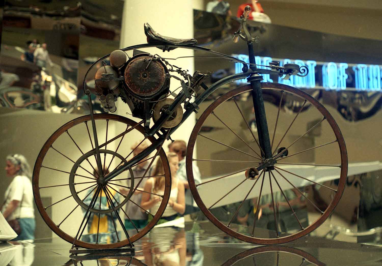 The Michaux-Perreaux steam velocipede is displayed at a museum.