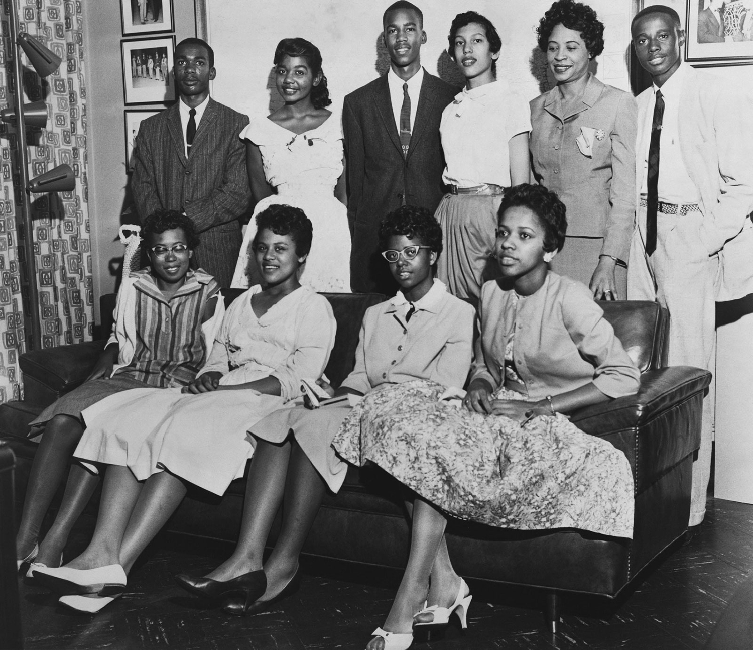 Daisy Bates poses for a photo with the students known as the Little Rock Nine.