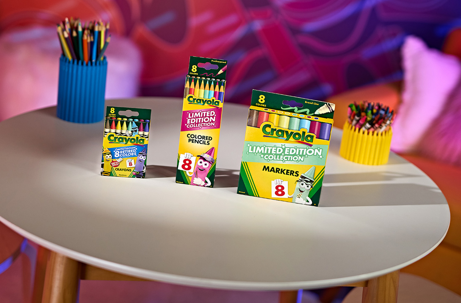 One box each of Crayola crayons, colored pencils, and markers marked Limited Edition sit on a table.