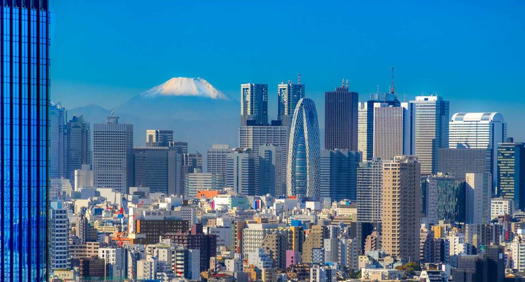 The Tokyo skyline with Mount Fuji in the background.