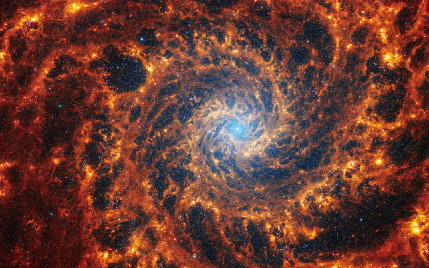 A spiral galaxy image that was captured by the James Webb Space Telescope.