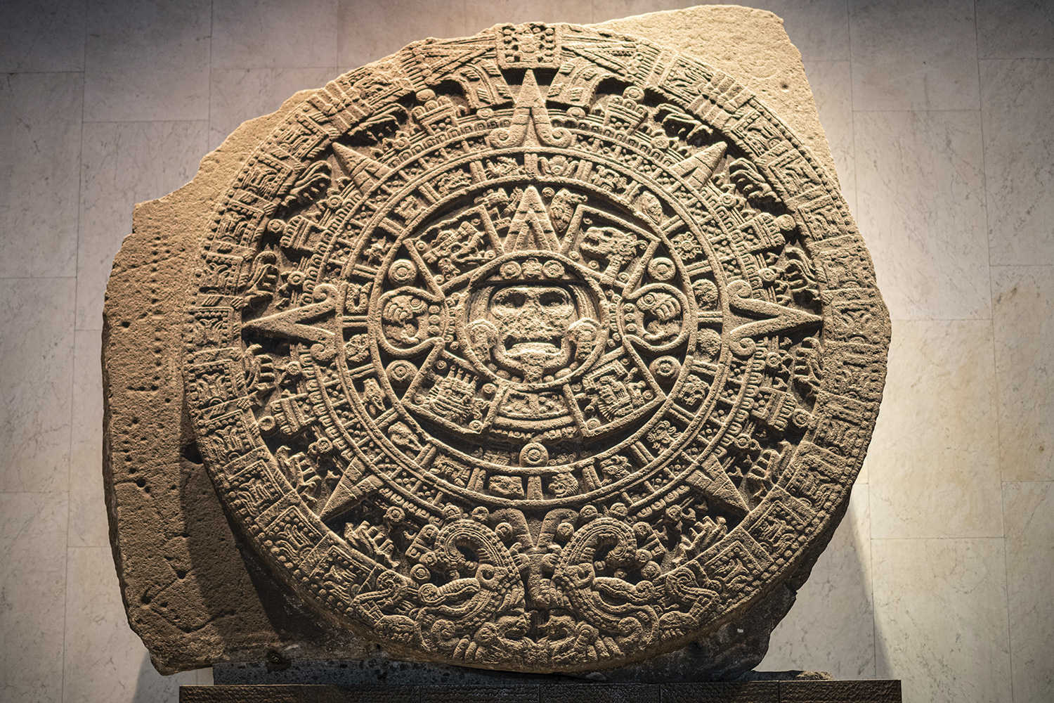 An intricately carved circular stone