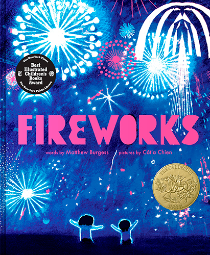 Two young children have their arms up as if to embrace a sky that is full of colorful fireworks.