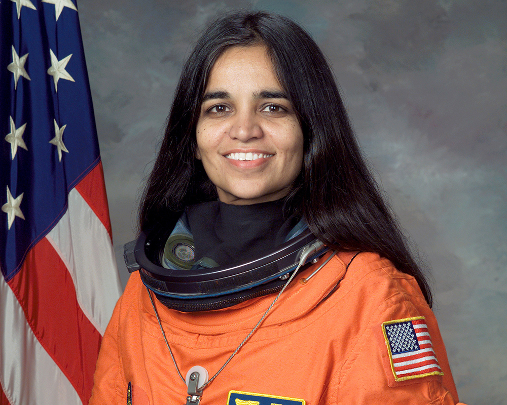 A portrait of Kalpana Chawla in her NASA uniform.