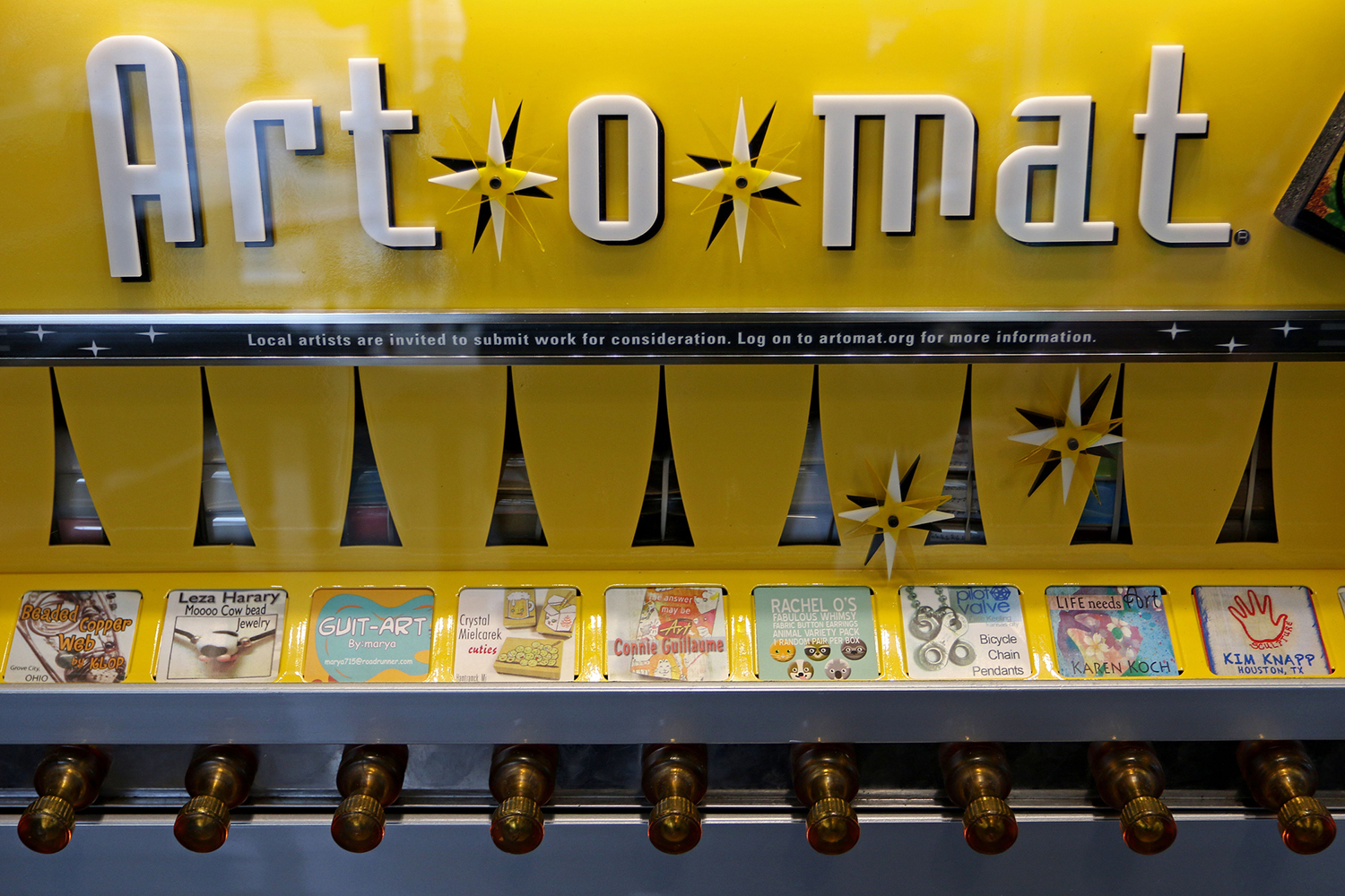 A machine called the Art-O-Mat contains tiny pieces of art for sale.