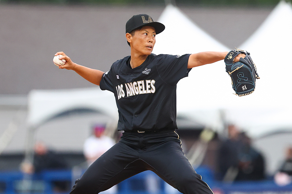 Ayami Sato is just about to pitch the ball.