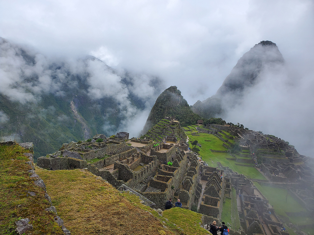 Ruins of Machu Picchu with mountains in the background.
