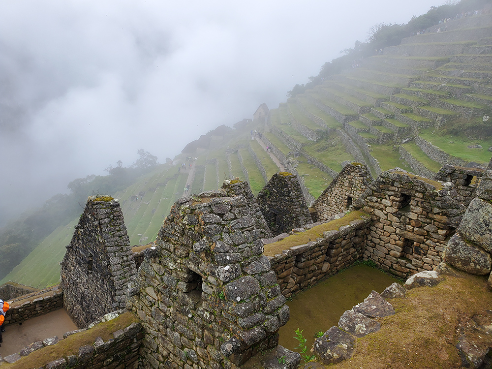 Ruins of Machu Picchu with mountains in the background.