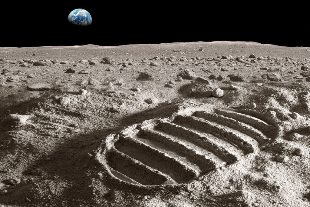 An astronaut’s footprint is on the surface of the Moon.
