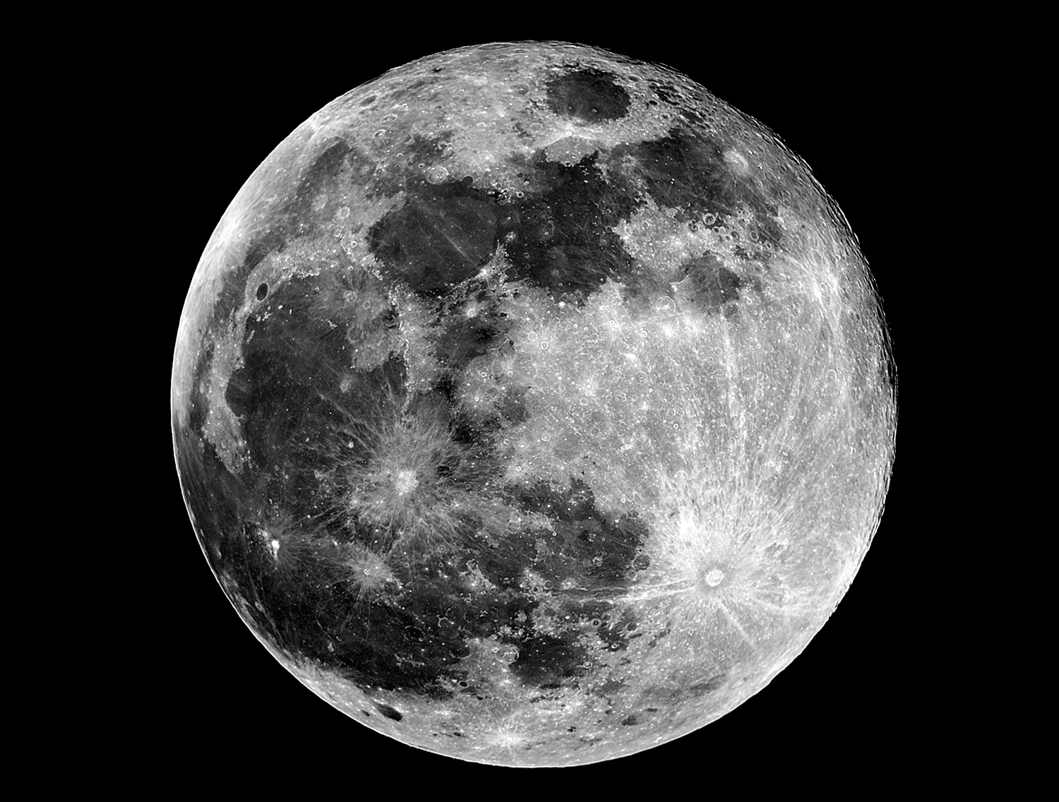 The Moon in space, in black and white.